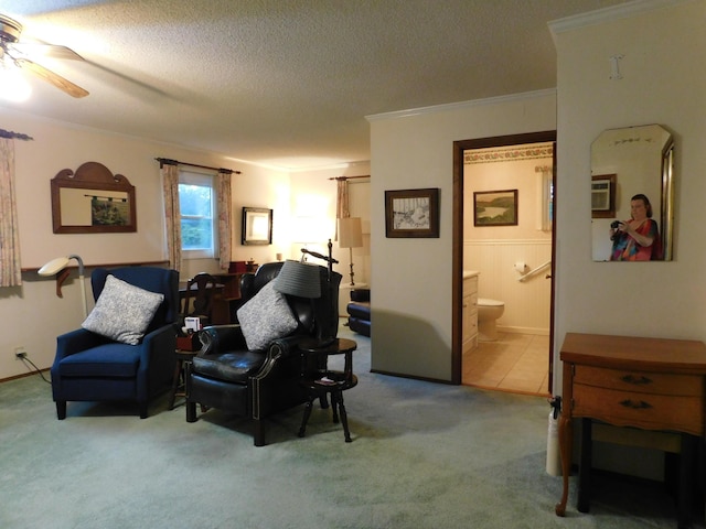 184 Meadow Dr, Harlan, KY 40831 - carpeted living area featuring ceiling fan, ornamental molding, and a textured ceiling