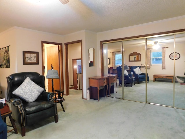 184 Meadow Dr, Harlan, KY 40831 - living area featuring light carpet, a textured ceiling, crown molding, and ceiling fan
