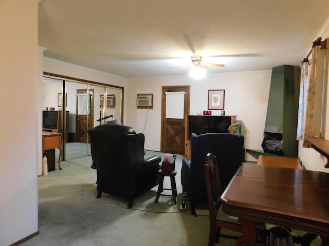 184 Meadow Dr, Harlan, KY 40831 - living room featuring carpet floors, a ceiling fan, and an AC wall unit