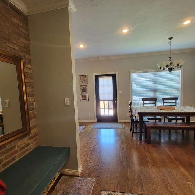 1136 Oatlands Park, Lexington, KY 40509 - dining area featuring a chandelier, ornamental molding, dark wood-style flooring, baseboards, and recessed lighting