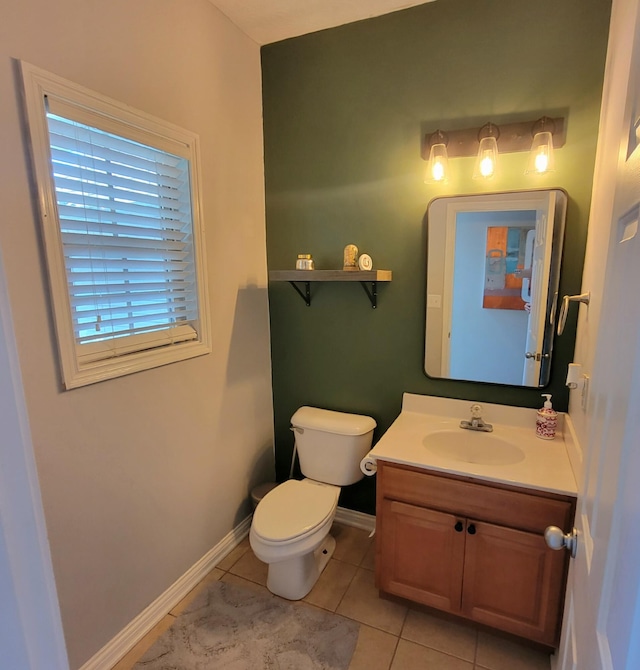 1136 Oatlands Park, Lexington, KY 40509 - bathroom with toilet, vanity, tile patterned flooring, and baseboards