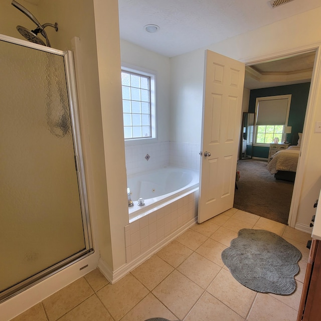 1136 Oatlands Park, Lexington, KY 40509 - ensuite bathroom with a stall shower, plenty of natural light, tile patterned flooring, and a tub with jets