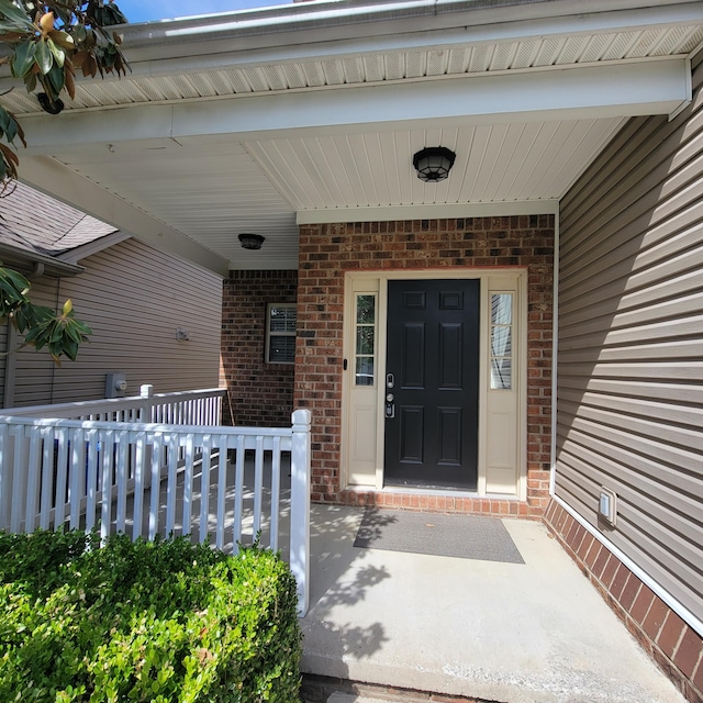 1136 Oatlands Park, Lexington, KY 40509 - property entrance with brick siding and a porch