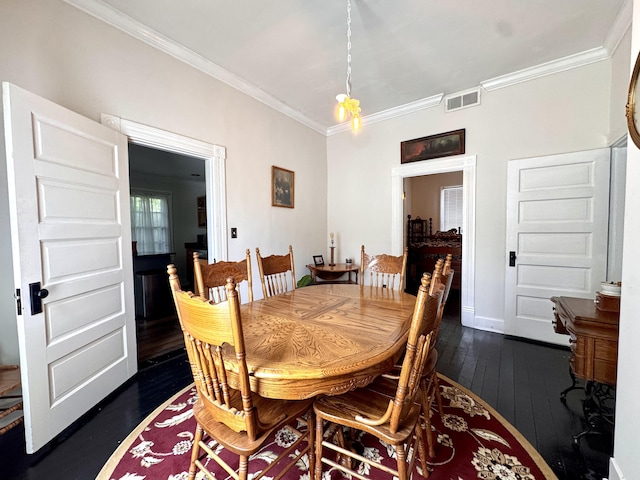 8 N Sycamore St, Mt Sterling, KY 40353 - dining space with dark wood-style floors, ornamental molding, and baseboards