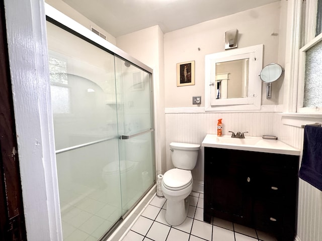 8 N Sycamore St, Mt Sterling, KY 40353 - full bath with toilet, vanity, a shower stall, a wainscoted wall, and tile patterned flooring