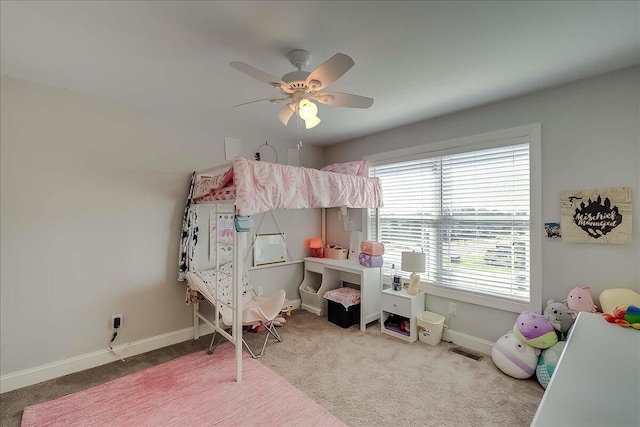 bedroom featuring carpet flooring, baseboards, and ceiling fan