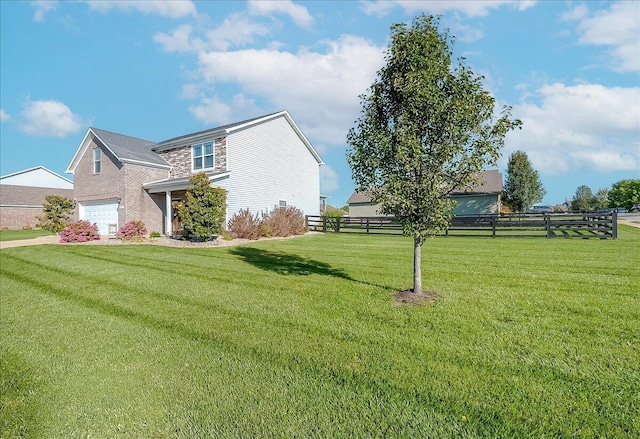view of home's exterior with an attached garage and stone siding