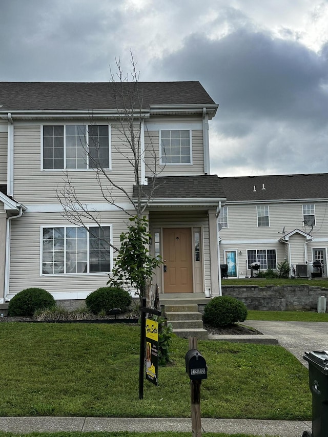 1213 Seminole Trl, Georgetown, KY 40324 - multi unit property featuring a front lawn and a shingled roof