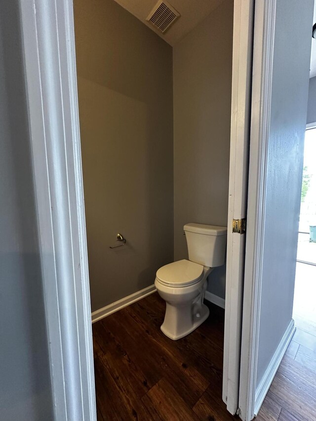 1213 Seminole Trl, Georgetown, KY 40324 - bathroom with toilet, wood finished floors, and baseboards