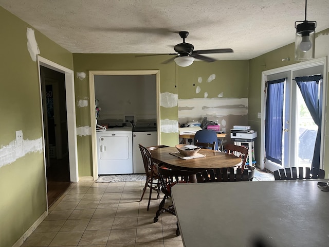 269 Old Somerset Rd, Mount Vernon, KY 40456 - dining room with washer and clothes dryer, a ceiling fan, tile patterned flooring, and a textured ceiling