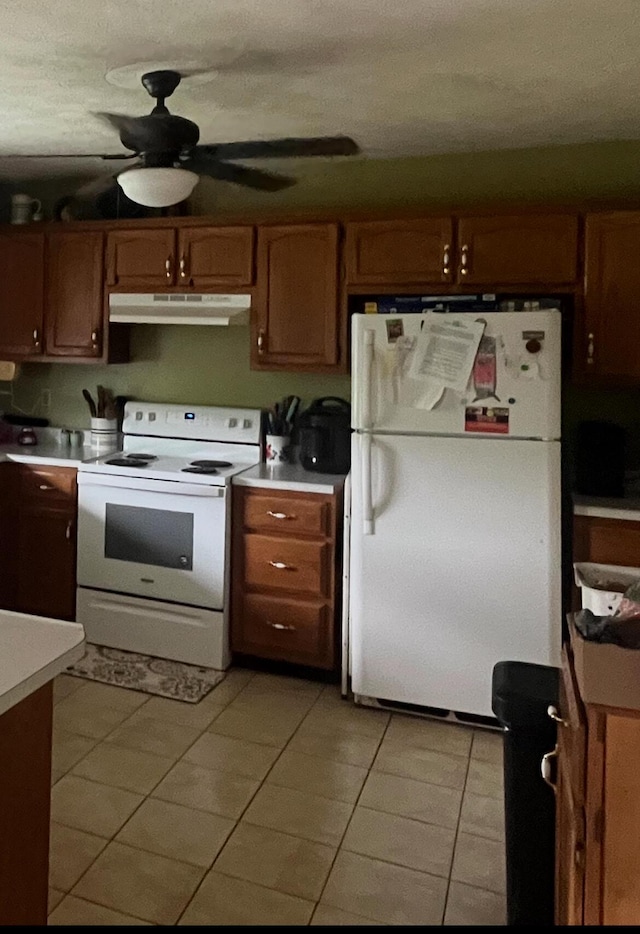 269 Old Somerset Rd, Mount Vernon, KY 40456 - kitchen featuring white appliances, under cabinet range hood, light tile patterned floors, light countertops, and a ceiling fan