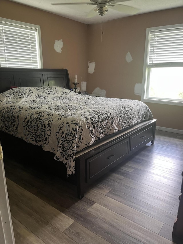 269 Old Somerset Rd, Mount Vernon, KY 40456 - bedroom with wood finished floors, baseboards, and ceiling fan