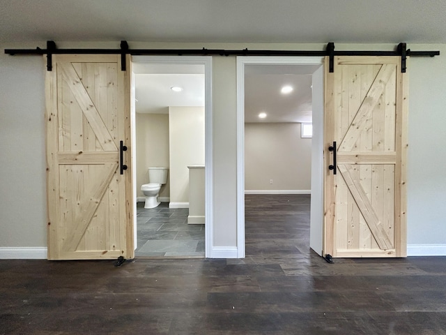 220 Jill Dr, Somerset, KY 42503 - interior space with a barn door, baseboards, wood finished floors, and recessed lighting