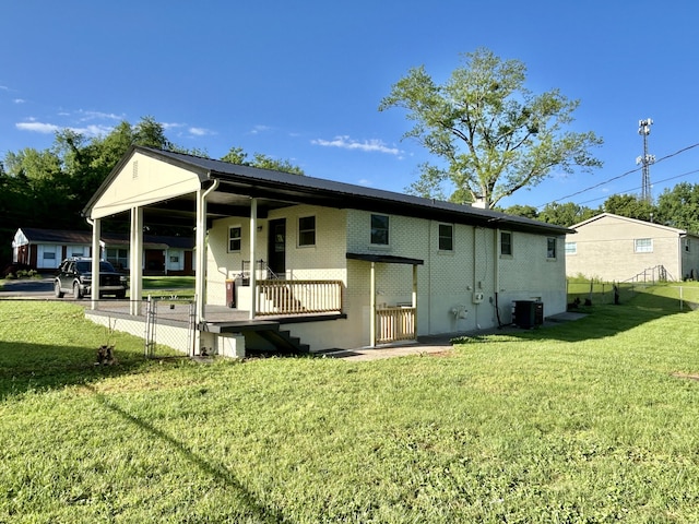 220 Jill Dr, Somerset, KY 42503 - rear view of property featuring central AC and a yard