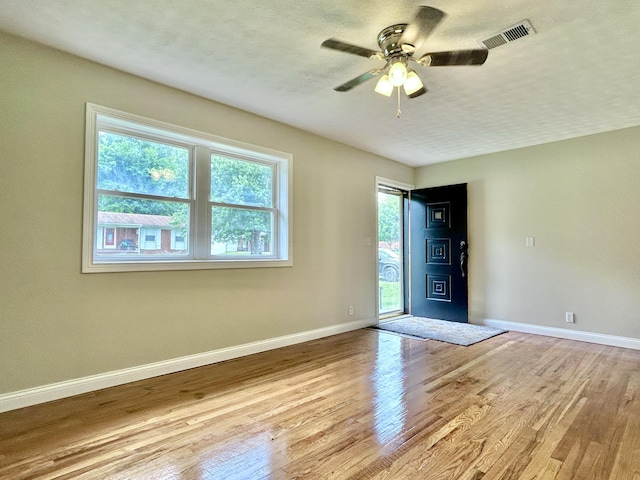 220 Jill Dr, Somerset, KY 42503 - empty room with wood finished floors, a ceiling fan, baseboards, and a textured ceiling