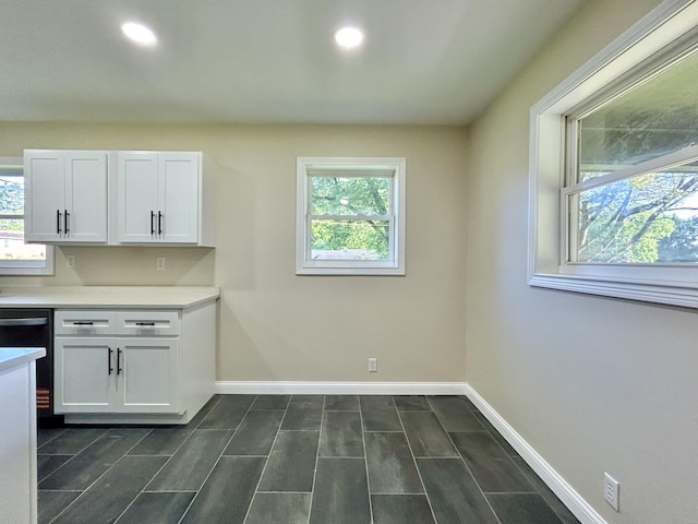 220 Jill Dr, Somerset, KY 42503 - unfurnished dining area featuring baseboards, recessed lighting, and wood tiled floors