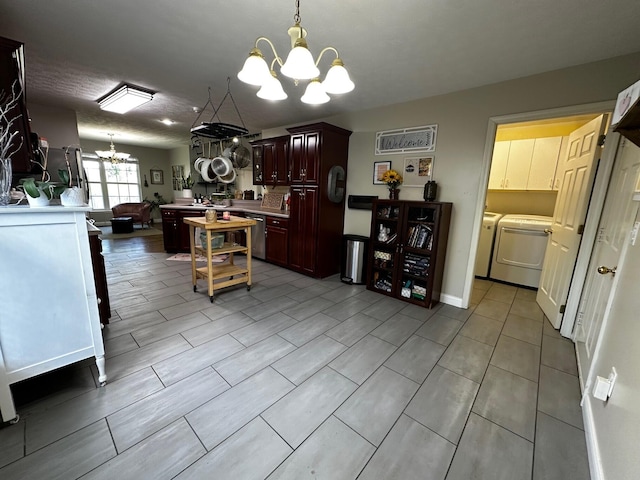 76 Waterford Way, Somerset, KY 42501 - kitchen with a chandelier, washing machine and dryer, pendant lighting, and light countertops