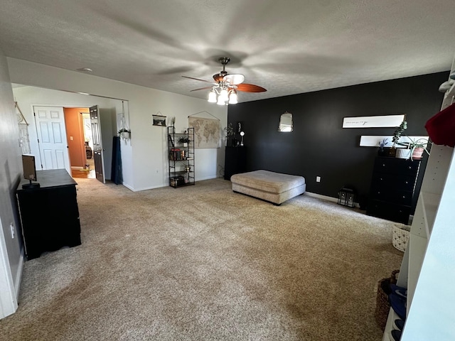 76 Waterford Way, Somerset, KY 42501 - living area with carpet floors, a ceiling fan, and baseboards