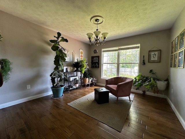 76 Waterford Way, Somerset, KY 42501 - sitting room featuring a chandelier, baseboards, a textured ceiling, and wood-type flooring