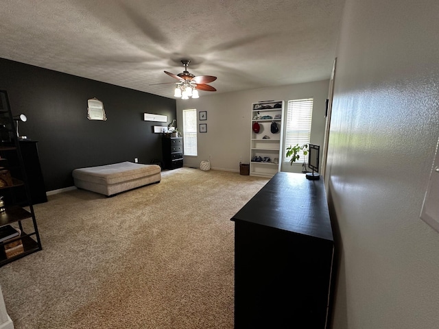 76 Waterford Way, Somerset, KY 42501 - living room featuring ceiling fan, carpet flooring, a textured ceiling, and baseboards