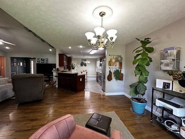 76 Waterford Way, Somerset, KY 42501 - living area with a chandelier, a textured ceiling, dark wood-style floors, baseboards, and ceiling fan