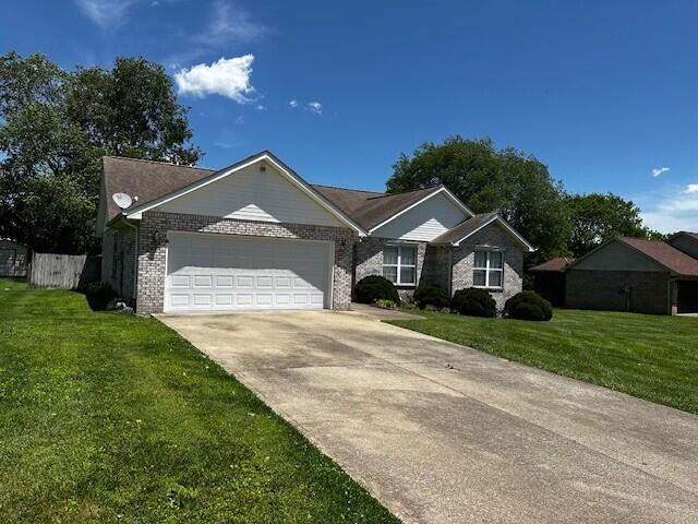 76 Waterford Way, Somerset, KY 42501 - ranch-style home featuring an attached garage, a front yard, concrete driveway, and brick siding