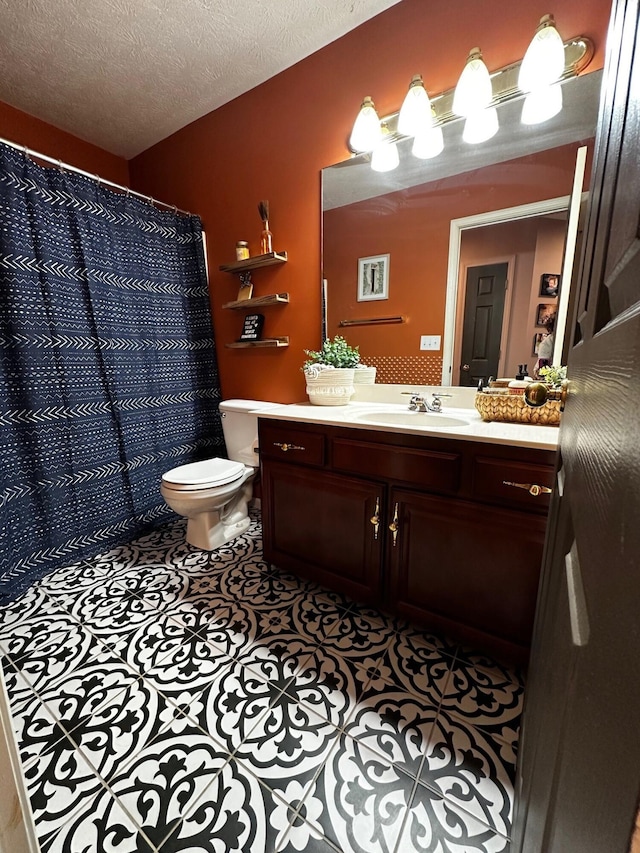 76 Waterford Way, Somerset, KY 42501 - full bath with toilet, tile patterned flooring, vanity, a textured ceiling, and a shower with shower curtain