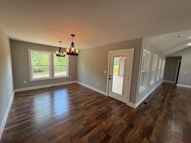 10 Nolan Dr, Corbin, KY 40701 - unfurnished room with a chandelier, dark wood finished floors, baseboards, and lofted ceiling