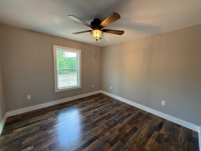 10 Nolan Dr, Corbin, KY 40701 - empty room featuring dark wood-type flooring, a ceiling fan, and baseboards