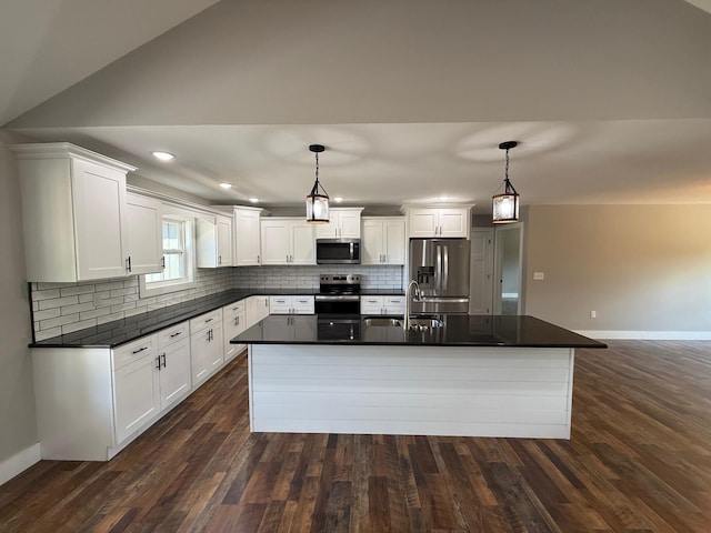 10 Nolan Dr, Corbin, KY 40701 - kitchen featuring appliances with stainless steel finishes, a sink, dark countertops, and backsplash