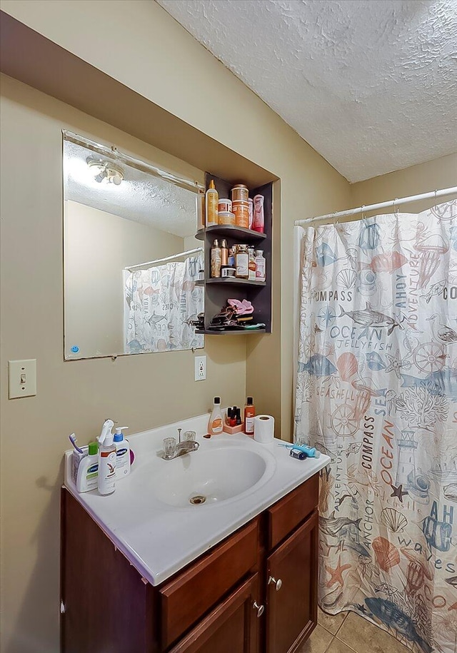 149 Willis Ave, Frankfort, KY 40601 - bathroom with a textured ceiling, vanity, tile patterned flooring, and a shower with curtain