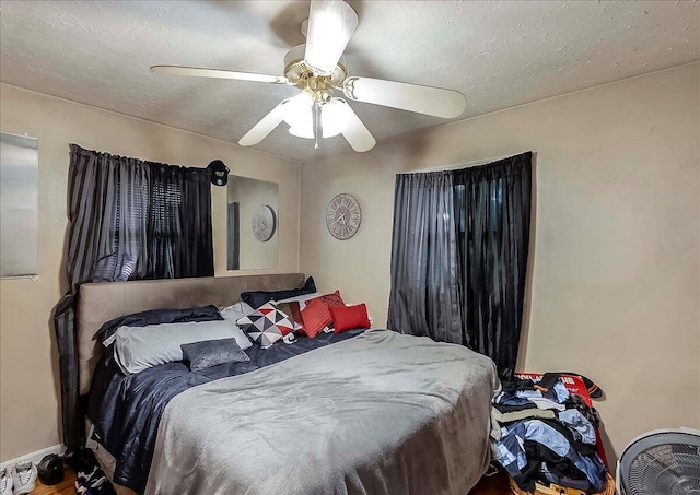 149 Willis Ave, Frankfort, KY 40601 - bedroom with a ceiling fan, wood finished floors, and baseboards