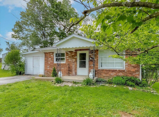 149 Willis Ave, Frankfort, KY 40601 - view of front of house with a front yard and brick siding