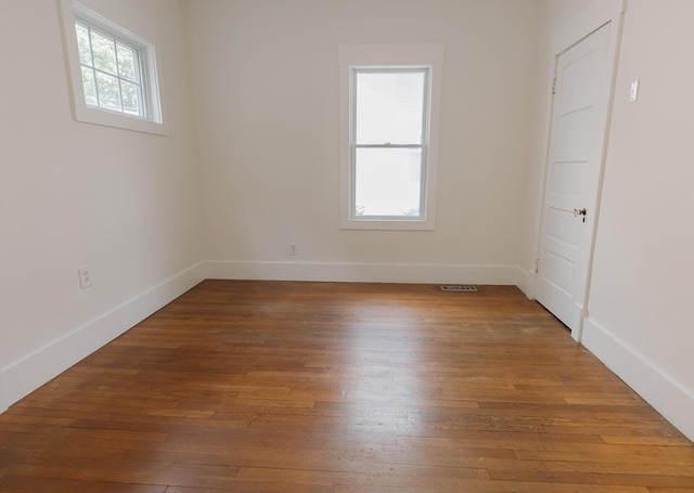 1010 Aurora Ave, Lexington, KY 40502 - empty room featuring hardwood / wood-style floors and baseboards