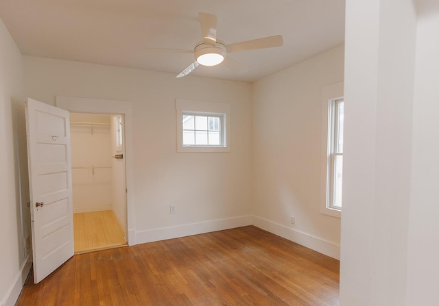 1010 Aurora Ave, Lexington, KY 40502 - unfurnished room with light wood-style flooring, baseboards, and a ceiling fan