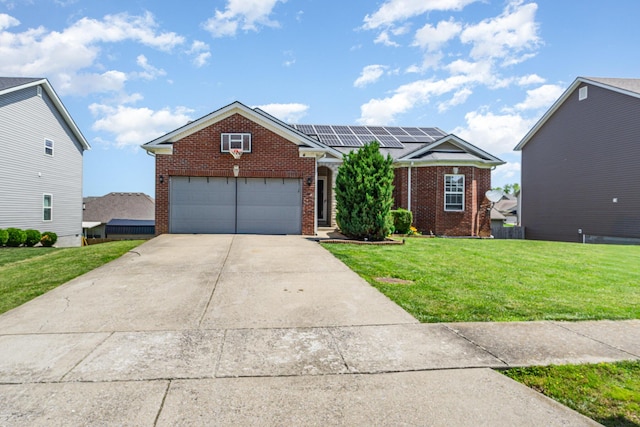 109 Rich Ln, Georgetown, KY 40324 - view of front of property featuring brick siding, a front lawn, and roof mounted solar panels