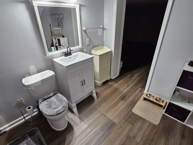 87 Park Estates Ln, London, KY 40744 - bathroom featuring toilet, wood finished floors, and vanity