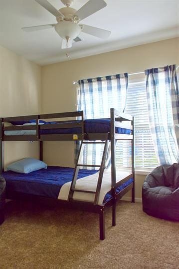 4218 Reserve Rd Unit 104, Lexington, KY 40514 - carpeted bedroom with ceiling fan and baseboards