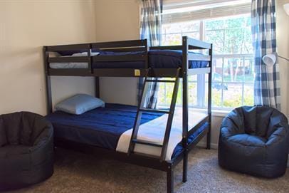 4218 Reserve Rd Unit 104, Lexington, KY 40514 - bedroom with multiple windows and carpet