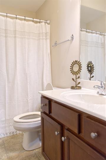 4218 Reserve Rd Unit 104, Lexington, KY 40514 - bathroom with toilet, vanity, and tile patterned floors