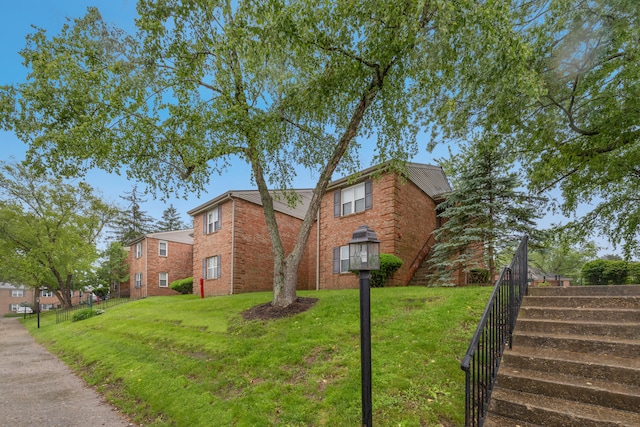 421 Redding Rd Unit 35, Lexington, KY 40517 - view of home's exterior with brick siding and stairway