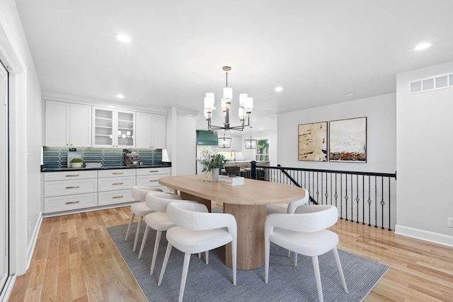810 Cooper Dr, Lexington, KY 40502 - dining space with a chandelier, light wood-style flooring, recessed lighting, and baseboards