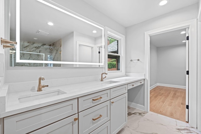 810 Cooper Dr, Lexington, KY 40502 - bathroom featuring a marble finish shower, double vanity, marble finish flooring, recessed lighting, and baseboards