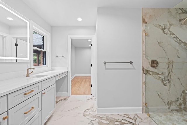 810 Cooper Dr, Lexington, KY 40502 - bathroom featuring a marble finish shower, vanity, recessed lighting, baseboards, and marble finish flooring