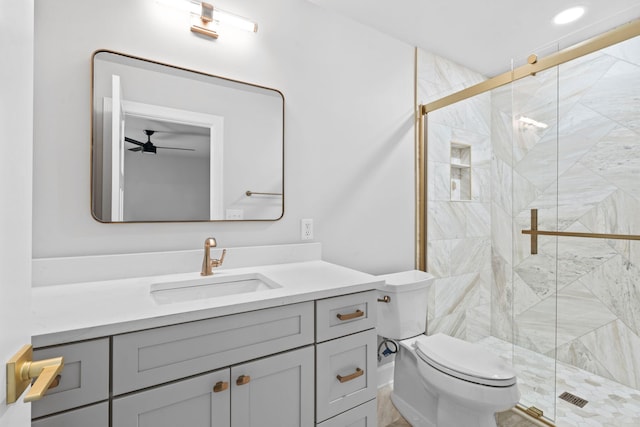 810 Cooper Dr, Lexington, KY 40502 - full bathroom featuring vanity, toilet, a ceiling fan, and a marble finish shower