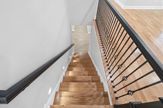 810 Cooper Dr, Lexington, KY 40502 - stairs featuring baseboards and wood finished floors