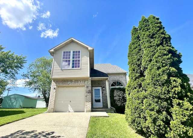 812 Statesman Way, Lexington, KY 40505 - traditional-style home with brick siding, concrete driveway, an attached garage, and a front lawn