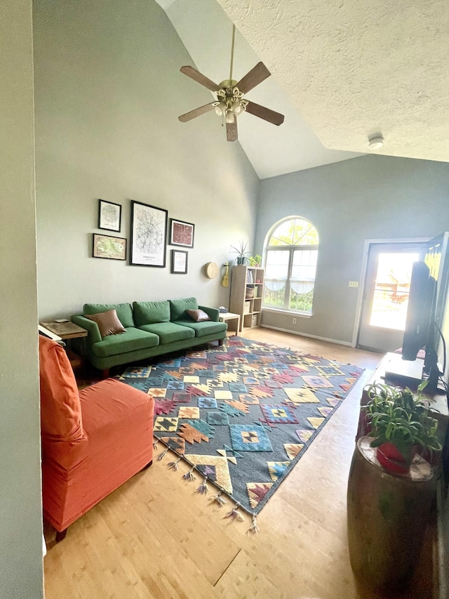 812 Statesman Way, Lexington, KY 40505 - living area featuring ceiling fan, high vaulted ceiling, and baseboards