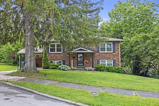 3488 Elmendorf Way, Lexington, KY 40517 - split level home featuring a front yard and brick siding