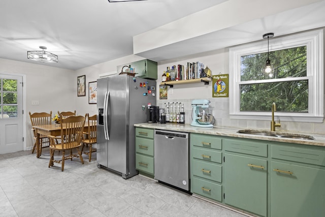 3488 Elmendorf Way, Lexington, KY 40517 - kitchen featuring stainless steel appliances, a sink, healthy amount of natural light, and decorative backsplash